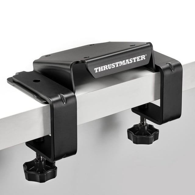 DESK MOUNTING KIT for T818 showing a black metal clamp with two adjustable screw knobs attached to a white desk edge, featuring the Thrustmaster logo, designed for solid desks 0.6 to 1.6 inches thick to securely mount the T818 racing wheel base.