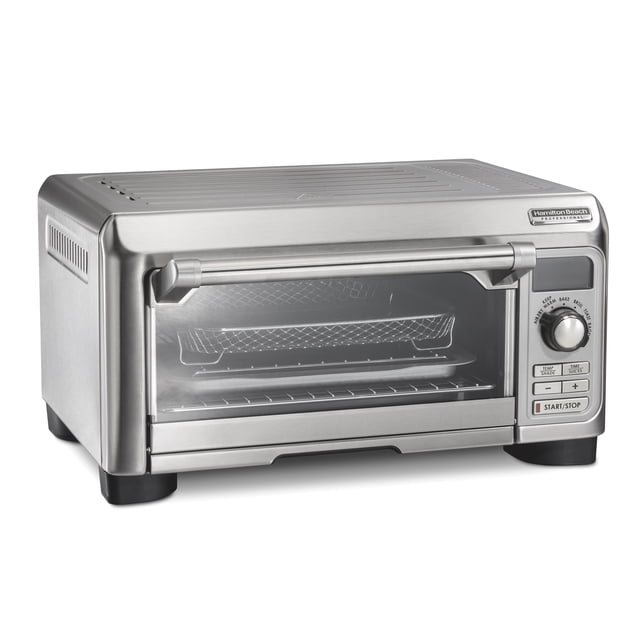 Hamilton Beach® Professional Sure-Crisp® Air Fry Digital Toaster Oven in stainless steel with digital controls and a clear front door showing the air fry basket, compactly sized for 4 slices of bread or a 10-inch pizza, featuring six cooking settings including air fry, bake, broil, toast, bagel, and keep warm.