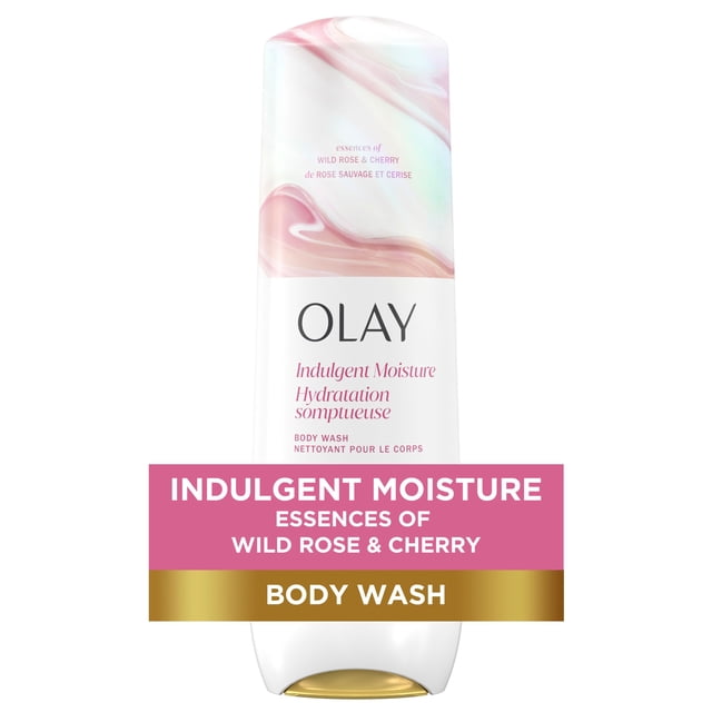 Olay Indulgent Moisture Body Wash infused with wild rose and cherry essences, in a white bottle with pink swirl design and gold flip-top cap, providing hydration and moisture for soft, glowing skin in bath and shower care.