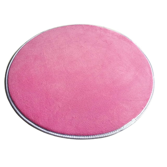Round Solid Coral Velvet Memory Foam Carpets Area Rug Bedroom Doormat Floor Mat Mats. A circular, solid pink rug made of coral velvet with a soft texture and non-slip backing. Designed for use in bedrooms, living rooms, or nurseries, it measures 80 cm in diameter. The rug is machine washable and retains its softness and absorbency after multiple washes.