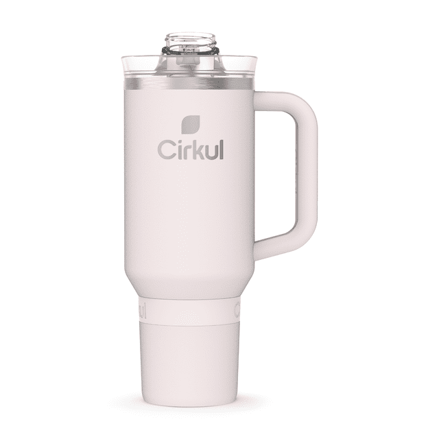Cirkul 40oz All-Day StrawSip™ Tumbler in Cherry Blossom light pink with BPA-free stainless steel double-wall vacuum insulated body, ergonomic comfort-grip handle, and spill-resistant clear lid featuring StrawSip technology for left and right-handed use, suitable for carrying flavored water with Cirkul Sip® cartridges.