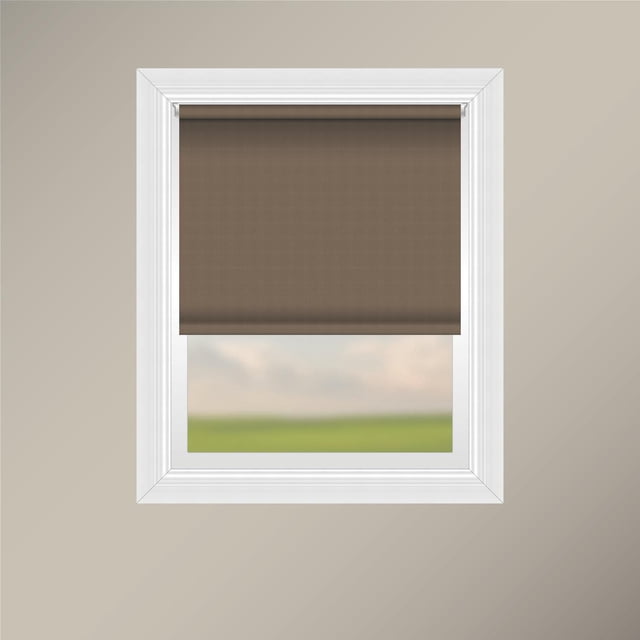 Off Cut Shades Chainless Solid Privacy Roller Shade in fawn color installed in a white window frame on a beige wall, featuring 100% polyester fabric with a sewn pocket and weighted hem for a clean finish, chainless operation for safety, and privacy fabric that blocks visibility while allowing exterior light.