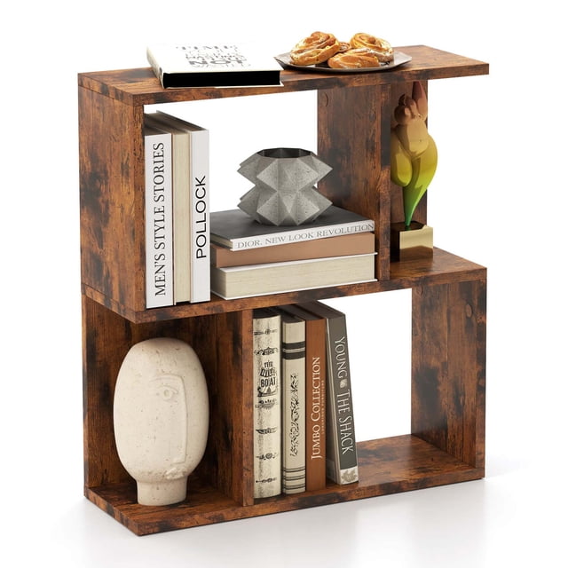 Costway 1 PCS Bibliothèque à 3 Niveaux Table d'Appoint Géométrique avec Étagère de Rangement Ouverte en Bois d'Ingénierie Brun Rustique. Présente un design Géométrique Moderne avec Trois Étagères Ouvertes pour Organiser des Livres, des Ornements et des Plantes en Pot. Compacte et Peu Encombrante, Idéale pour les Salons, les Chambres Ou les Salles d'Étude. Comprend des Patins Antidérapants pour la Stabilité et des Autocollants à Trous de Vis pour une Finition Propre.