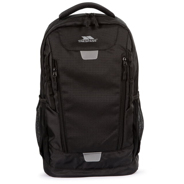 Trespass 22L Backpack Daypack Thain in black with padded back support and carry handle. Ideal for school or daily use, it includes an internal padded laptop pocket, two zipped front pockets, two side pockets, daisy chains, and reflective tags for visibility. Made from durable 100% polyester with PVC coating.