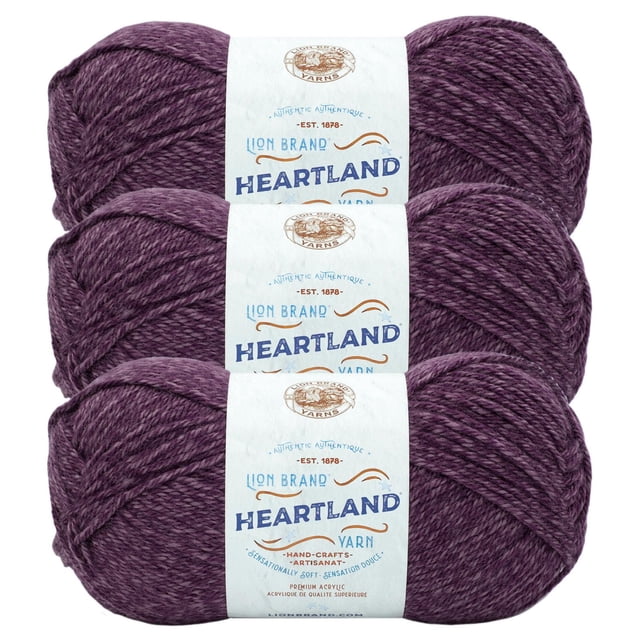 Lion Brand Yarn Heartland Yarn 3Pack featuring three skeins of medium worsted weight acrylic yarn in a heathered purple colour, each wrapped with a white label displaying the brand logo and product details, suitable for knitting and crochet projects.