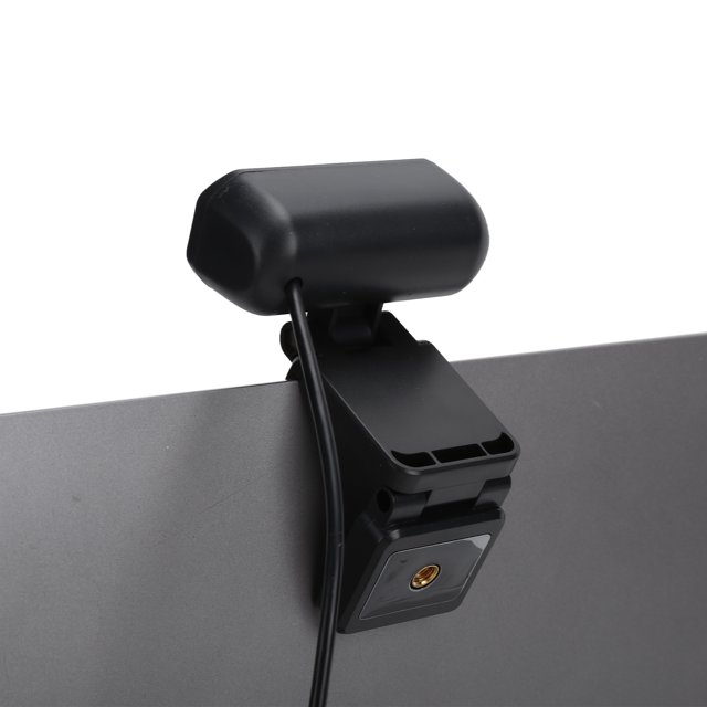 Herwey 1080P Web Camera Full HD Webcam with noise-cancelling microphone, clipped to a computer monitor using its multifunctional base. This HD webcam features a manual focus design, USB 2.0 interface, and compatibility with multiple operating systems.