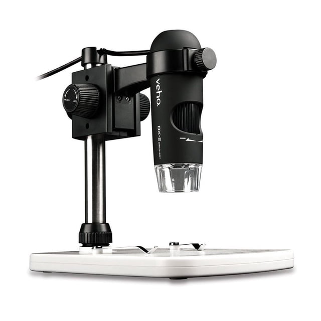 Veho DX-2 USB 5MP Microscope with 300X magnification showing a black cylindrical microscope body with adjustable focus mounted on a height-adjustable metal stand with control knobs, attached to a white rectangular base with sample clips, ideal for industrial and scientific inspection.