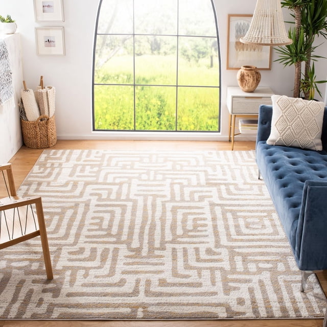 SAFAVIEH Amsterdam Tapis Géométrique Elvan beige et Blanc Cassé avec Motif Géométrique tribal, Tissé Mécaniquement à Partir de Fils Synthétiques Durables. Positionné sur un Plancher de Bois Franc Clair dans un Salon Lumineux avec un sofa Capitonné Bleu et une Chaise en Bois. Convient à une Déco Rustique Chic et un Revêtement de Sol Doux dans les Espaces de Détente.
