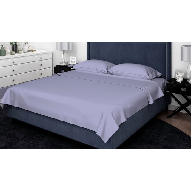 Johnson Home 300 Thread Count Combed Egyptian Cotton Sheet Sets in light lavender on a navy blue upholstered bed with nailhead trim headboard, featuring a flat sheet and two pillowcases neatly arranged, showcasing breathable, soft fabric ideal for year-round comfort in a modern bedroom with white dresser and black nightstands with lamps.