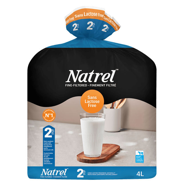 Natrel Lactose Free 2% milk in a 4L bag, fine-filtered partly skimmed milk with 2% M.F., labeled lactose free and made in Canada, showing a glass of milk on a wooden board on a kitchen counter, an excellent source of calcium, vitamin D, and protein, suitable for lactose-free cooking.