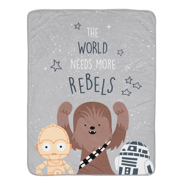 Lambs & Ivy Star Wars Rebels Baby Blanket in gray, featuring Chewbacca, R2-D2, and C-3PO on the front. The phrase 'The World Needs More Rebels' is printed at the top in dark gray and white, surrounded by starry details. Made from luxurious minky fabric with a soft gray faux shearling back for added comfort and warmth. Sized at 30” x 40”, this officially licensed Star Wars blanket is ideal for use as a stroller blanket, over a car seat, or for keeping a baby cozy. A popular baby registry item and a thoughtful baby shower gift.