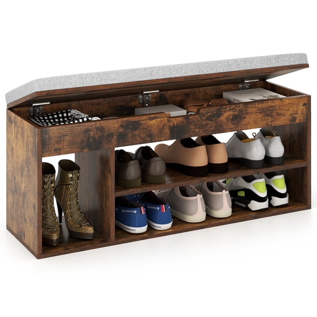 Gymax Banc à Chaussures pour l'Entrée de la Maison, Banc de Rangement pour Chaussures avec Siège Rembourré et Rangement Dissimulé, Fini Brun. Conçu avec Trois Tablettes Spacieuses pour Organiser Diverses Chaussures et un Compartiment de Rangement Dissimulé pour de Petits Articles comme des Clés Ou des Pièces à Monnaie. Comprend un Coussin Amovible avec Rembourrage en Mousse Souple pour une Assise Confortable. Fabriqué en Bois d'Ingénierie avec une structure stable Pouvant Supporter jusqu'à 495 Lb. Comprend des Patins Antidérapants et des Charnières de Sécurité pour une Utilisation Sécuritaire. Idéal pour les Entrées, les Chambres Ou les Salons
