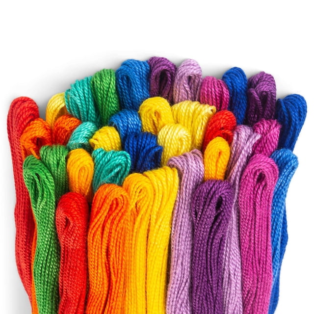 COATS & CLARK CRAFT THREAD RAINBOW COLORS 36 COUNT displaying 36 skeins of 100% mercerized cotton craft thread in vibrant rainbow colors including red, orange, yellow, green, blue, purple, and pink, neatly looped and arranged on a white background, ideal for embroidery, macramé, friendship bracelets, and string art projects.