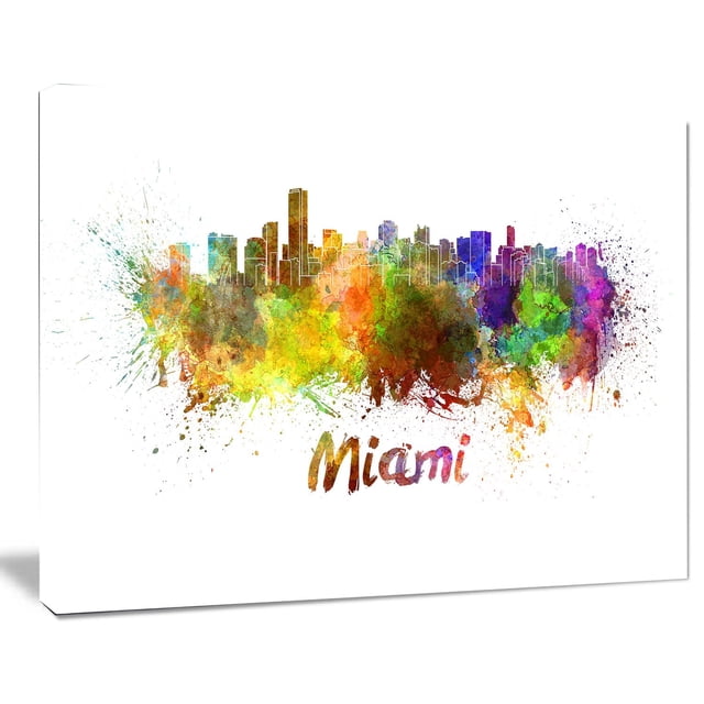 Design Art Miami Skyline Canvas Print on gallery wrapped cotton canvas depicting an abstract watercolor Miami city skyline in vibrant splashes of yellow, green, blue, purple, and orange, ready to hang with included hardware, suitable for enhancing home or office décor.