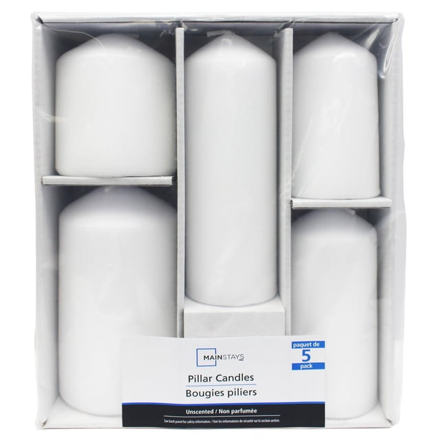 Mainstays Unscented Pillar Candle Set with five white unscented pillar candles in varying sizes, packaged in a white compartmentalized box, suitable for indoor Christmas decorations and creating warm ambient lighting.