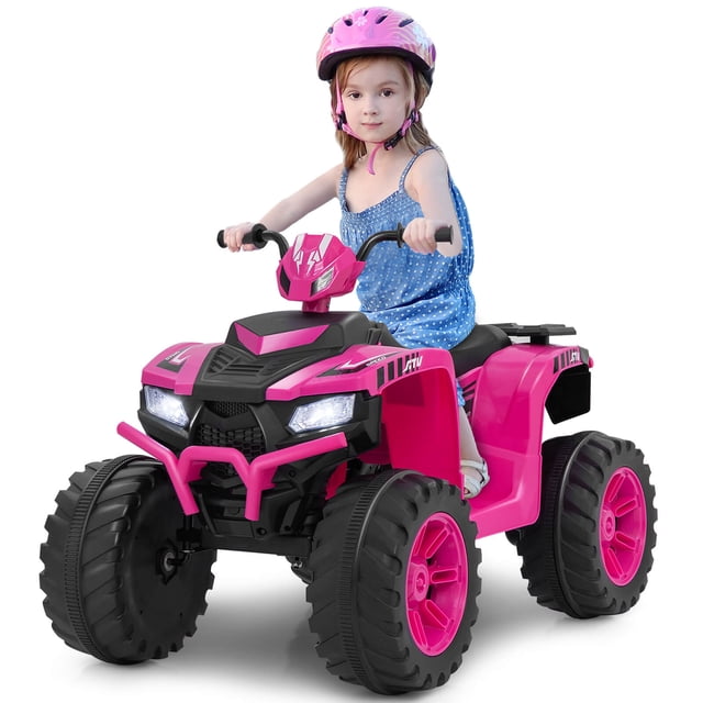 Costway 24V Kids Ride-On Electric ATV 4-Wheeler Quad Car in pink, designed for children aged 3-8. The ATV features a sturdy build with puncture-proof treaded tires, anti-slip handles, and wide footrests for stability. It includes a media center with wireless connection, music, and radio, as well as LED headlights for a realistic driving experience. The vehicle offers two speed settings, 3.1 MPH and 1.7 MPH, controlled by pedal or button. A child is shown riding the ATV, wearing a helmet, highlighting its safety features like the soft start mechanism and ergonomic seat. Suitable for various terrains such as gravel, lawn, and mud.