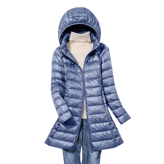 RKSTN Puffer Jacket Womens Lightweight Removable Hood Lightweight Down Jacket Mid-length Plus Size Zipper Thin Jacket with Pockets. The jacket is shown in a mid-length design with a shiny, quilted texture and a removable hood. It features a front zipper closure, long sleeves, and two side pockets. The lightweight material and slim fit make it suitable for casual winter wear. Displayed in a blue color, paired with a beige sweater and jeans.