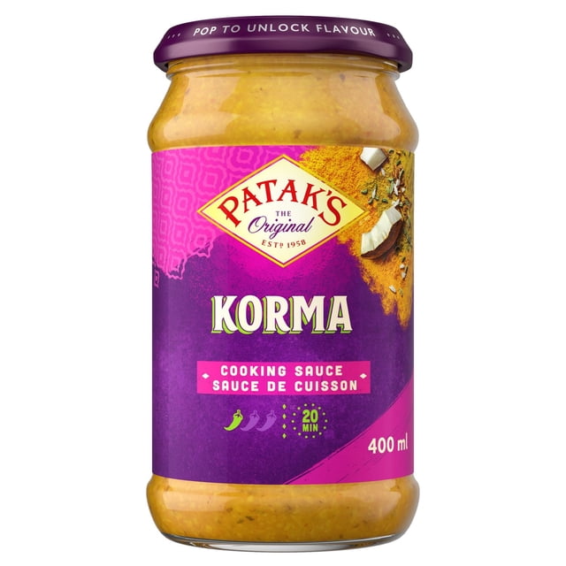 Patak's Korma Cooking Sauce in a 400 ml glass jar with a purple label and lid, featuring the brand logo and text describing a mild, creamy coconut-based Indian cooking sauce ideal for authentic curry dishes, gluten free, vegan, and free from artificial flavours and preservatives.
