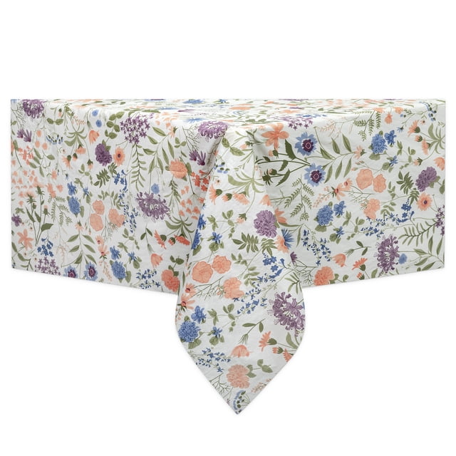 Mainstays PEVA tablecloth with 100% polyester and non-woven flannel backing, featuring a floral pattern of purple, blue, and peach flowers with green leaves on white, waterproof and stain-resistant, draped over a rectangular table, ideal for dining and entertaining.