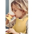 thumbnail image 2 of BabyBjorn Baby Bib 1-pack, Powder yellow, 2 of 3