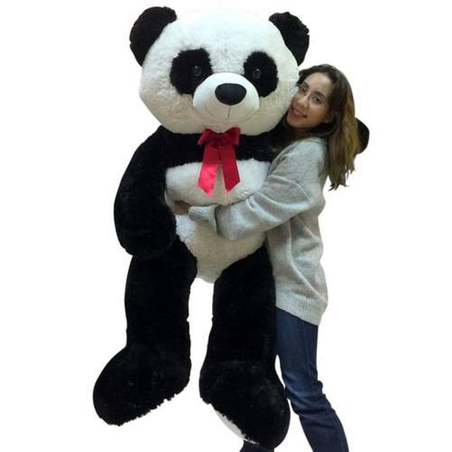 5 Foot Giant Stuffed Panda Soft 60 Inch Big Plush Premium Teddy Bear displayed upright, showcasing its black and white plush body, squeezably soft texture, and a removable red satin neck ribbon. This life-size plush toy is ideal for hugging and cuddling, conforming to child safety standards. Perfect as a gift or decorative piece.