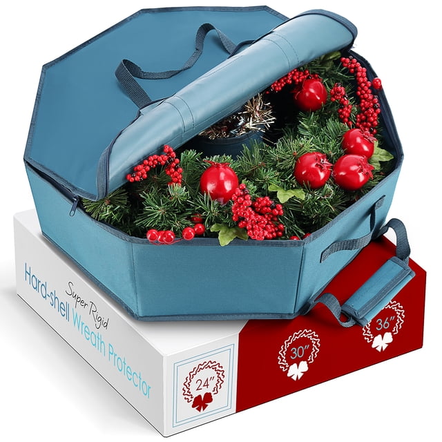 Hearth & Harbor Wreath Storage Container with a hard shell design, shown in a 24-inch size. The teal storage bag features dual zippers, reinforced handles, and interior pockets for organizing Christmas wreaths and accessories. The container is displayed open, holding a decorated wreath with red berries and ornaments, placed on a branded box indicating available sizes of 24, 30, and 36 inches.