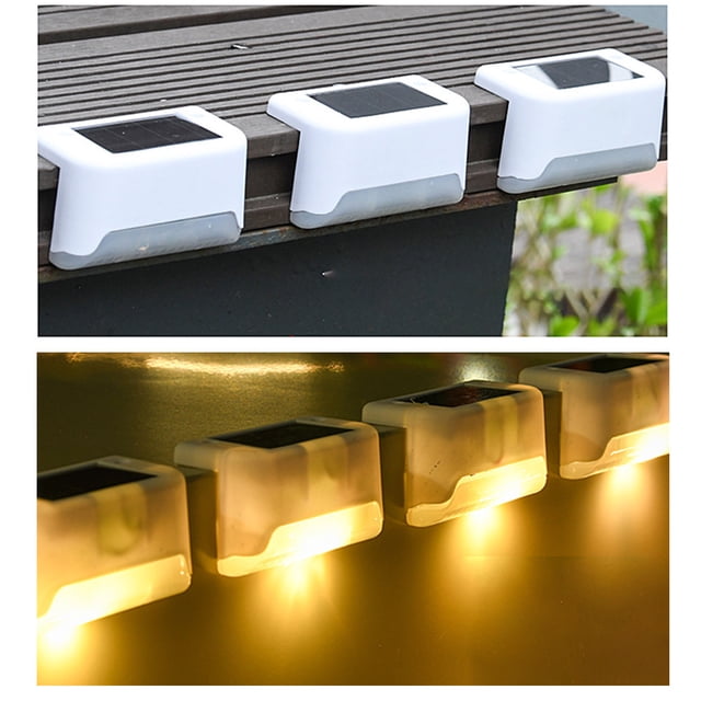 TopLLC Solar Lights Outdoor 4 Pack featuring white plastic solar step lights with warm LED illumination. These waterproof lights are designed for outdoor use on stairs, patios, yards, and fences. The compact size of 3.15x1.77x1.65 inches allows for easy installation with tape or screws. The lights are shown mounted on a wooden surface during the day and glowing warmly at night, highlighting their auto on/off functionality and IP65 waterproof rating.