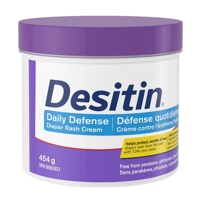 Desitin Daily Defense Baby Diaper Rash Cream with 13% Zinc Oxide in a 454-gram jar with purple lid and bilingual English-French label, hypoallergenic and free from parabens, phthalates, dyes, and fragrances, clinically proven to soothe, treat, and prevent diaper rash from first use, ideal for daily baby skin care.