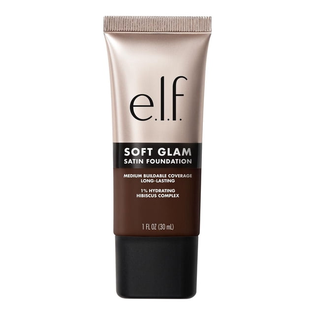 e.l.f. Cosmetics Soft Glam Satin Foundation in a 30 ml tube with beige and brown gradient and black cap, offering medium buildable coverage and long-lasting hydration with 1% hibiscus complex, suitable for dry, oily, and combination skin for a smooth satin finish.