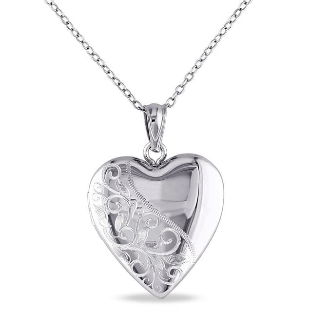 Asteria Sterling Silver Engraved Heart Locket Pendant, 18" is a polished sterling silver heart-shaped pendant necklace with detailed filigree engraving on one side, suspended from an 18-inch cable chain with a spring ring clasp, ideal as a female jewelry gift.