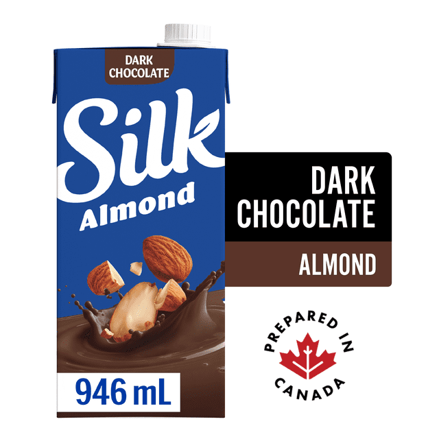 Silk Almond Milk Alternative dark chocolate, dairy-free, shelf-stable in a 946 mL blue carton with white screw cap, showing almonds splashing into dark chocolate liquid, labeled prepared in Canada.