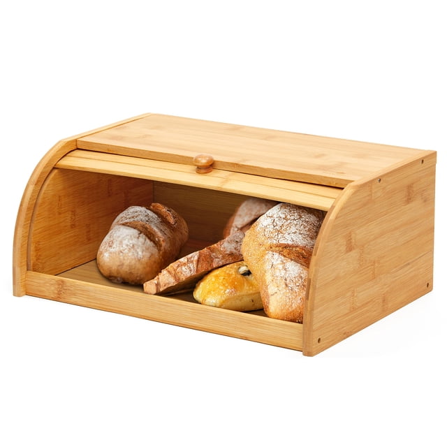 RoyalHouse Premium Bamboo Bread Box, a bread storage and organizer made from 100% bamboo, featuring a roll-top lid and a warm natural finish. The box is shown on a kitchen countertop, storing various types of bread, including loaves and pastries. Assembly required.