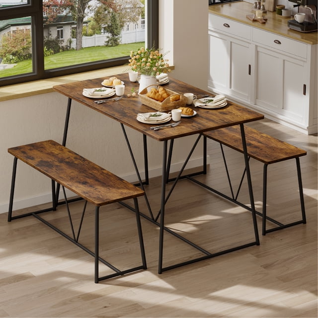 Pinmoco 3pcs Dining Table Set with 2 Benches Rustic Dining Room Table Set featuring a rectangular wooden tabletop with a rustic finish and black metal frame. The set includes two matching benches with the same design, which can be tucked under the table for space-saving convenience. Ideal for small spaces like apartments or kitchens, this set accommodates up to four people and is shown in a bright dining area with natural light and a view of a garden.