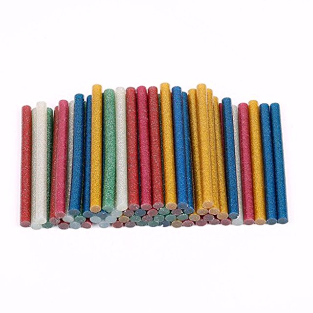 MasteelfCA 100PCS Color Glitter Powder Stick Glitter Glue Sticks in random colors, made from eco-friendly EVA material. These mini hot melt glue sticks, approximately 10 x 0.7 x 0.7 cm in size, are displayed in vibrant colors such as red, blue, green, gold, and white. Ideal for arts and crafts, school projects, DIY, and general repairs.