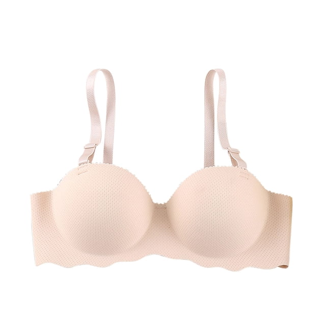 Timegard Women's Push Up Bra in a seamless, wire-free design with adjustable straps, shown in a neutral beige tone. The bra features a breathable, stretchy fabric with a flexible cup surface that adapts to different breast shapes. It has a scalloped edge along the band and a classic back design for added support and comfort. Suitable for pairing with various outfits, including t-shirts, tank tops, and blazers.