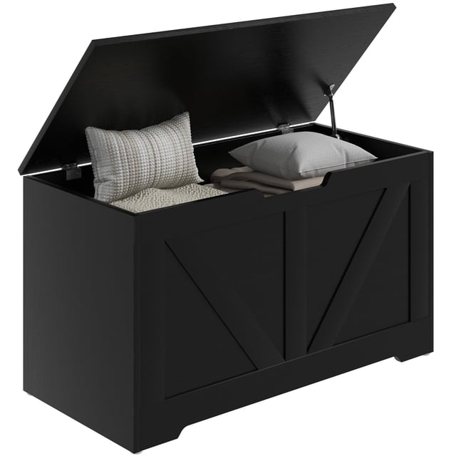 HOMCOM Coffre de Rangement pour Salon, Boîte en Bois, 31,5 Pouces L, Noir. Ce Coffre de Rangement à grain de Bois Noir Présente un Intérieur Spacieux avec un Couvercle à Charnière de Sécurité et une Découpe en U pour un Fonctionnement Fluide. Fait de Panneau de Particules Enduit de Mélamine, Il Sert Aussi de Banc avec une Capacité de Poids de 300 Lb. des Patins Antidérapants Offrent de la Stabilité, et le design Rustique Ajoute du Charme à Toute Pièce. Dimensions : 31,5 Pouces L x 15,7 Pouces P x 17,7 Pouces H