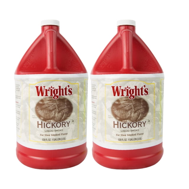 Deux Contenants de 1 Gallon de Fumée Liquide au Hickory de Wright's avec Capuchons Rouges et Étiquettes Mettant en Vedette le Nom de la Marque et une image de Viande Fumée. Cette Fumée Liquide Riche et Fumée Est Idéale pour Rehausser la Saveur des Viandes, sauces, marinades et Plus. Fabriquée à Partir de Vraie Fumée de Bois de Hickory, Elle Ne Contient Pas de Sel, de Gras Ni de Couleurs, Offrant une Façon Polyvalente et Pratique d'Ajouter une Saveur Fumée Authentique à Divers Plats.