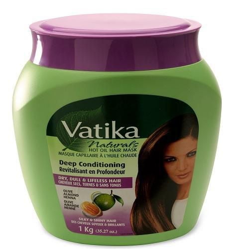Vatika Hamam Deep Conditioning hair mask in a green plastic jar with a purple lid, enriched with olive, almond, and henna oils for deep conditioning dry, dull, and lifeless hair, 1 kg (35.27 oz) size.