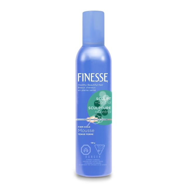 Finesse Firm Control Mousse in a blue cylindrical bottle with a blue cap, featuring white and green text highlighting keratin protein for healthy hair, firm hold, and sculpting control, ideal for hair styling and frizz control, containing 150 g, with flammable warning symbols on the front.