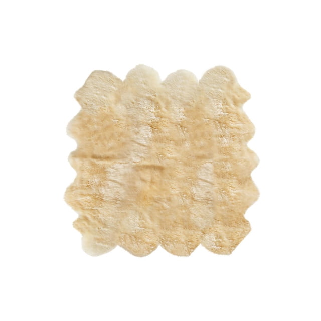 NEW ZEALAND SHEEPSKIN OCTO RUG 7' X 6' in natural beige with 100% New Zealand sheepskin fur, featuring a thick 2.5-inch pile and scalloped edges, soft micro suede anti-skid backing for indoor use, suitable for high-traffic areas and often used as a plush seat cover or draped over furniture.
