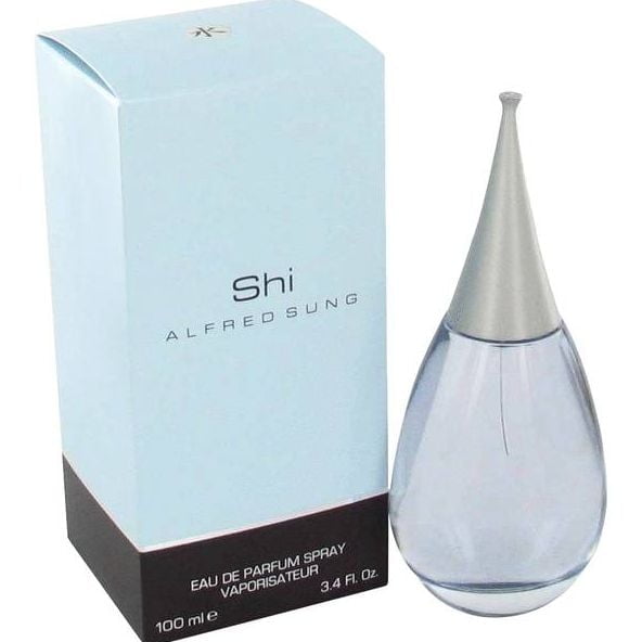 Shi Alfred Sung Women's Eau De Parfum Spray product shot with spray atomizer and bottle; described by the seller as a light floral rhapsody scent for women, presented on a neutral background, marketed as a floral Eau de Parfum and often used as a compact travel fragrance option.