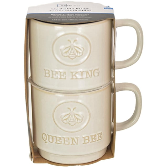 Bee 2 Piece Mug Set with two stacked beige stoneware coffee mugs embossed with bee logos and the phrases 'BEE KING' and 'QUEEN BEE', designed for hot and cold beverages and packaged in simple cardboard, suitable for coffee or tea drinkers.
