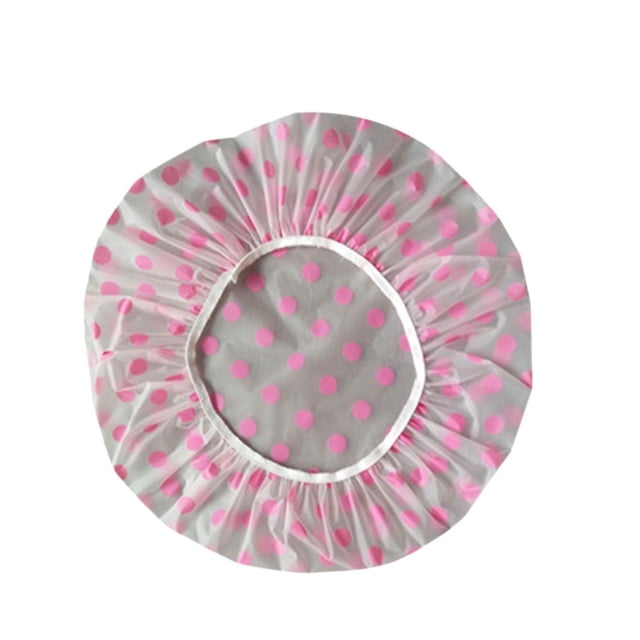Shower to Shower reusable shower cap, designed with pink polka dots on a grey background. Elastic band provides a secure fit for hair up to 44 cm (17.32 inches). Lightweight and foldable for travel, ideal for hair protection during showers, spas, and hair salons. A practical bath accessory, package includes two caps.