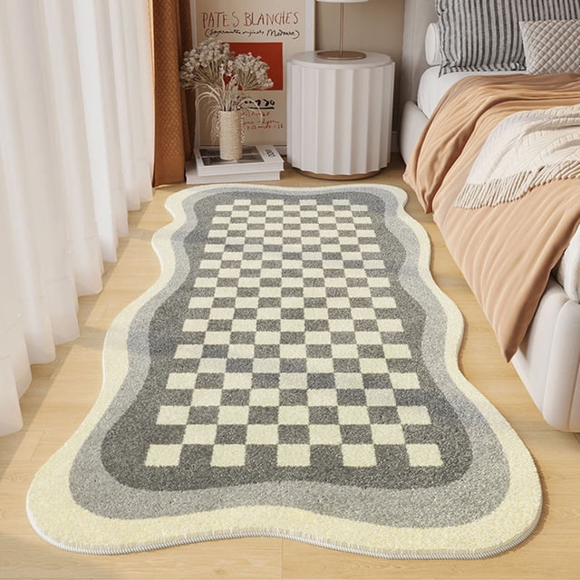 Matoen12 Ultra Soft Plush Bedroom Rugs, Shaggy Area Rugs for Bedroom, Living Room Runner Rug Non Slip Modern Home Decor 23.6"x63". The rug features a wavy border and a checkered pattern in grey and cream tones, adding a modern touch to the bedroom decor. It is made of medium pile microfiber for a soft, skin-friendly feel and includes a durable rubber backing for stability. Perfect for high-traffic areas and versatile for various interior styles.