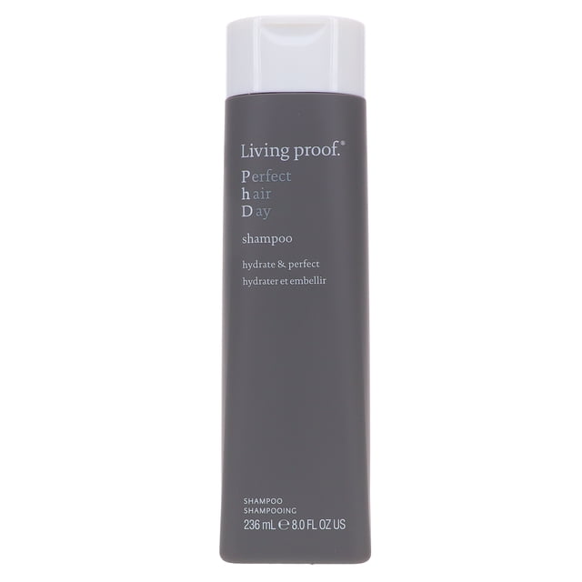 Living Proof Perfect Hair Day Shampoo 8 oz bottle with a sleek, dark grey design and white text. This sulfate-free shampoo is formulated to gently cleanse, hydrate, and improve hair health while enhancing shine and volume. Suitable for all hair types, including color-treated and chemically processed hair. The bottle features a flip-top cap for easy dispensing.