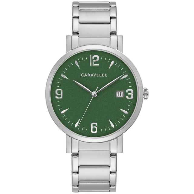 Caravelle Mens Silver-Tone Quartz Watch with a 39mm stainless steel case and bracelet, featuring a deep green dial with silver-tone hour markers and hands, date window at 3 o'clock, domed mineral crystal, short foldover clasp, and water resistance up to 50m, often used as a stylish accessory for both casual and formal wear.