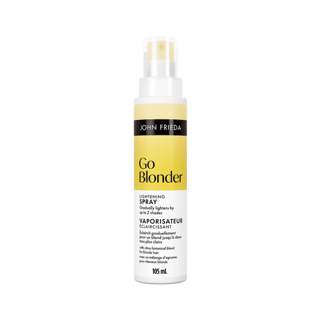 John Frieda Go Blonder Lightening Spray, for Blondes front-facing 105 mL white spray bottle with John Frieda label and nozzle; label text indicates gradual lightening for natural or colour-treated blonde hair, works with heat tools to lighten in 3–5 uses (max 10), and lists paraben-free, cruelty-free, vegan-friendly; suitable for quick root touch-ups between salon visits.