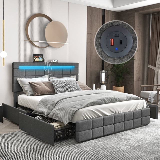 Gymax Full Upholstered Platform Bed with LED Headboard Charging Station Storage Drawer in gray linen fabric. The bed features a tufted headboard with RGB LED lights offering 20 static colors and 22 dynamic modes, adjustable brightness, and flashing speeds controlled via remote. The headboard includes two USB ports for device charging and adjustable height to fit mattresses 8-12 inches thick. The platform bed has four large storage drawers with casters for easy access, ideal for storing clothes or bedding. Supported by solid wooden slats and metal legs, it has a weight capacity of 880 lbs. The modern design complements bedroom interiors.