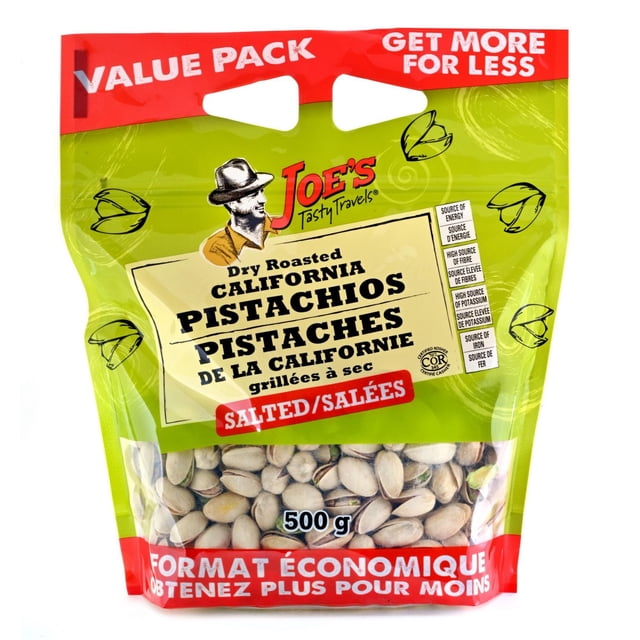Dry Roasted California Pistachios with Salt in a 500 g resealable value pack by Joe's Tasty Travels, featuring salted pistachios in a green and red bag with bilingual English and French text highlighting nutritional benefits like energy, fiber, potassium, and iron, suitable as a healthy snack or nut topping.