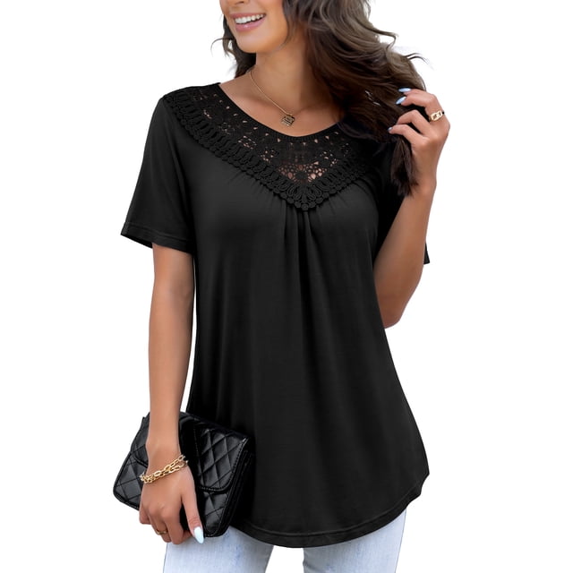 FOLUNSI Women's Plus Size Summer Tops Short Sleeve Lace Pleated Blouses Tunic Tops M-4XL. A black short-sleeve tunic top featuring a lace splicing design along the O-neckline, pleated detailing on the front, and a flare hem. Made from a soft, lightweight, and stretchy fabric blend of 95% rayon and 5% spandex, offering a casual loose fit. Styled with light-wash jeans and accessorized with a quilted black clutch and gold jewelry.